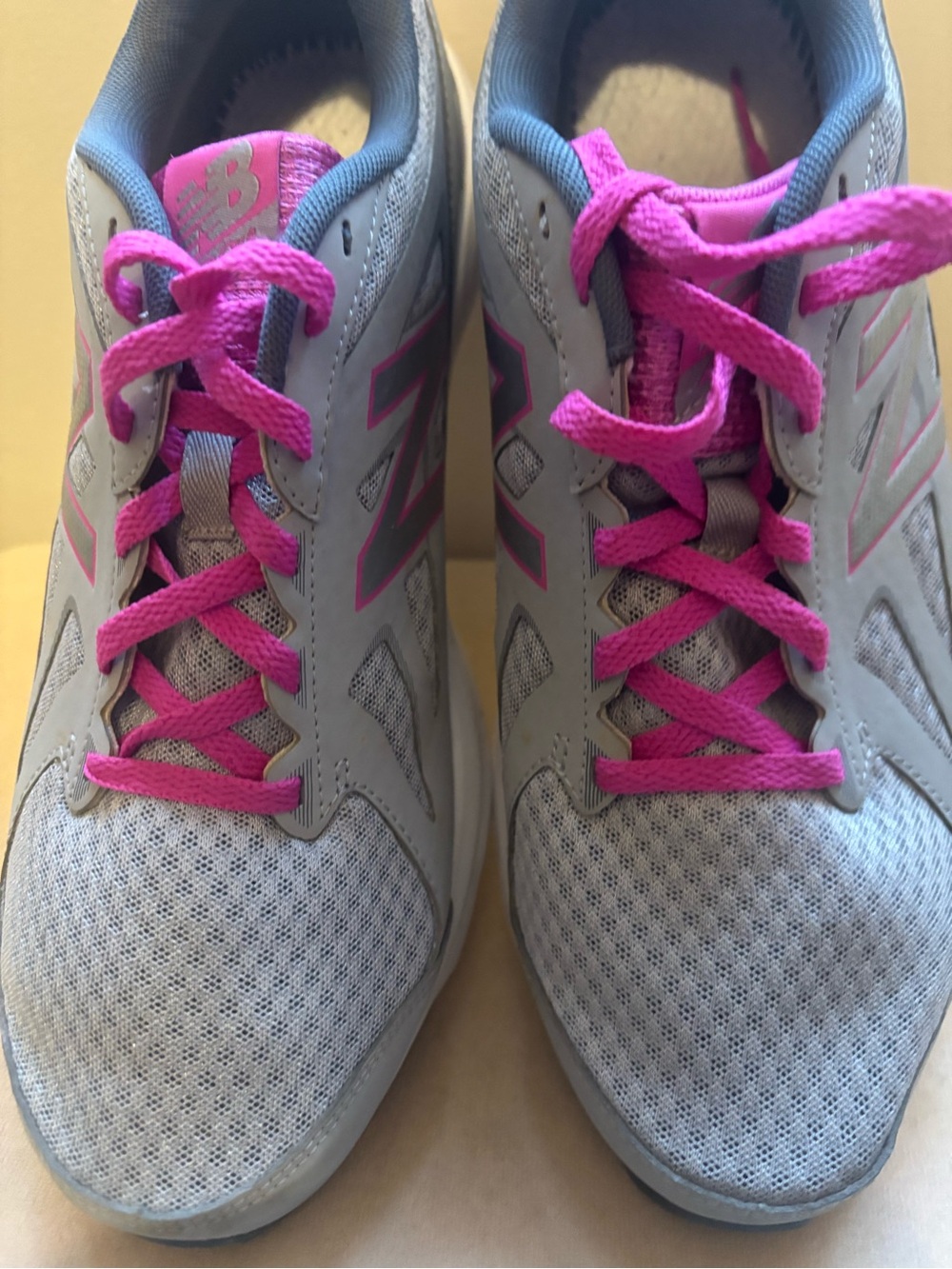 New Balance Women's Gray Athletic Sneakers with Pink Accents